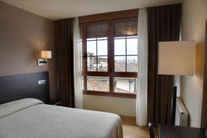 Cama o camas de una habitación en Hotel Baltico
