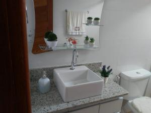 Vannituba majutusasutuses QUARTO CASA FREDERICO