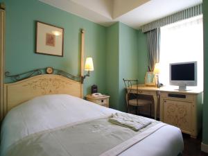 Postel nebo postele na pokoji v ubytování Hotel Monterey Lasoeur Ginza