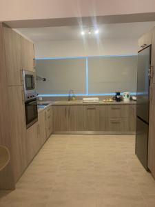 Kuchyň nebo kuchyňský kout v ubytování KOS SUITE HOME