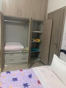 Postel nebo postele na pokoji v ubytování KOS SUITE HOME