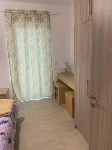 Postel nebo postele na pokoji v ubytování KOS SUITE HOME