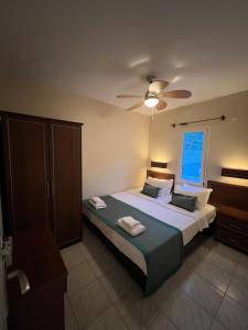 Giường trong phòng chung tại The Aegean Gate Hotel