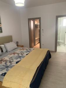 Postel nebo postele na pokoji v ubytování KOS SUITE HOME