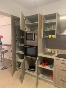 Kuchyň nebo kuchyňský kout v ubytování KOS SUITE HOME