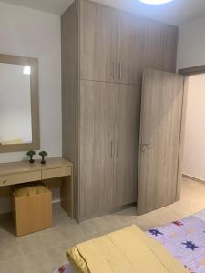 Postel nebo postele na pokoji v ubytování KOS SUITE HOME