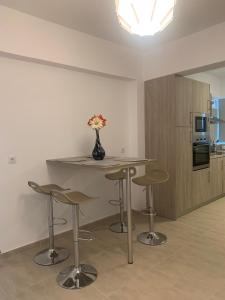 Kuchyň nebo kuchyňský kout v ubytování KOS SUITE HOME