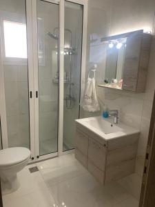 Koupelna v ubytování KOS SUITE HOME