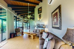 a living room with a couch and a table at Mauna Kai 8B in Princeville