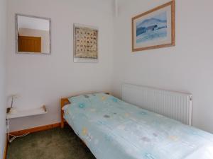 Giường trong phòng chung tại Pen Y Graig