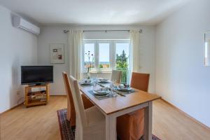 TV a/nebo společenská místnost v ubytování Apartment Peyo