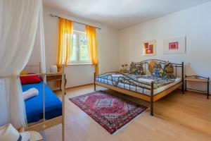 Postel nebo postele na pokoji v ubytování Apartment Peyo