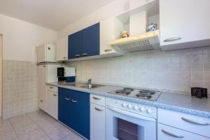 Kuchyň nebo kuchyňský kout v ubytování Apartment Peyo