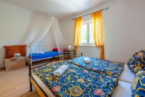 Postel nebo postele na pokoji v ubytování Apartment Peyo