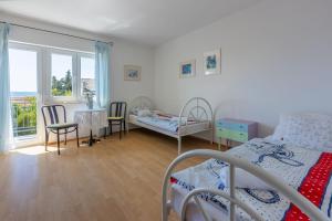 Postel nebo postele na pokoji v ubytování Apartment Peyo