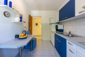 Kuchyň nebo kuchyňský kout v ubytování Apartment Peyo