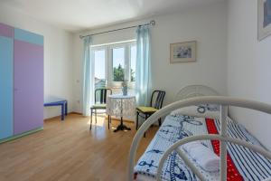 Postel nebo postele na pokoji v ubytování Apartment Peyo