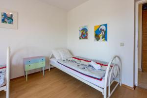 Postel nebo postele na pokoji v ubytování Apartment Peyo