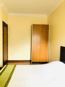 Postel nebo postele na pokoji v ubytování Hotel Chua Gin