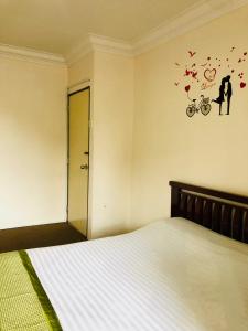 Postel nebo postele na pokoji v ubytování Hotel Chua Gin