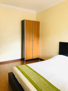 Postel nebo postele na pokoji v ubytování Hotel Chua Gin
