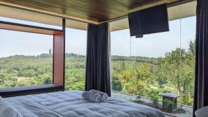 Postel nebo postele na pokoji v ubytování NANO Eco-Hostel