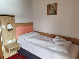 Voodi või voodid majutusasutuse Hotel Lindwurm toas