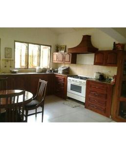 Kuchyň nebo kuchyňský kout v ubytování Embiente Guest House