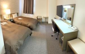 Postel nebo postele na pokoji v ubytování Hotel Yassa