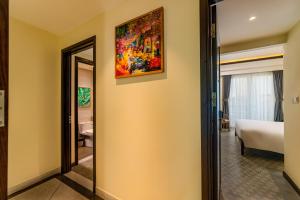 Hoi An Merrily De Art Hotel客房内的一张或多张床位
