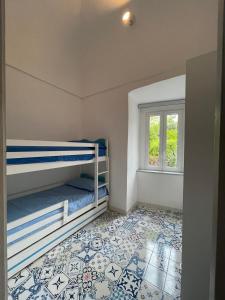 A bed or beds in a room at Petit Maison Jeranto Még 16 kép