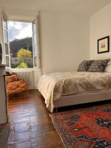 Un pat sau paturi într-o cameră la NOUBAR