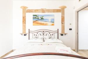 Postel nebo postele na pokoji v ubytování Salentoandmore - Villa La Macchia + 37 fotografií