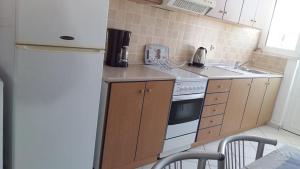 Fotografie z fotogalerie ubytování Pantheon Deluxe Apartments v destinaci Archangelos + 61 fotografií