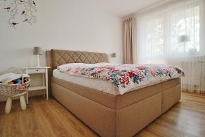 Postel nebo postele na pokoji v ubytování Jediný apartmán Tatranská Štrba