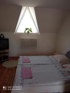 A bed or beds in a room at Agro privat