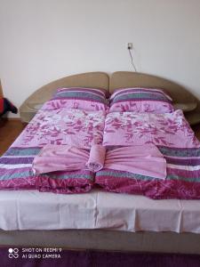A bed or beds in a room at Agro privat
