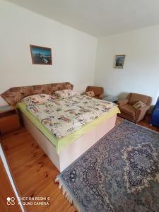 A bed or beds in a room at Agro privat