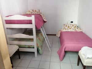 Posteľ alebo postele v izbe v ubytovaní B&B Nonna BI