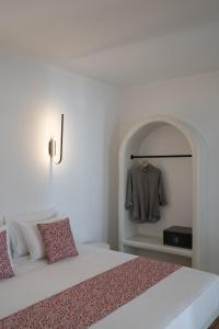 Letto o letti in una camera di Asha Luxury Suites