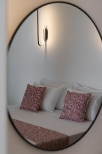 Letto o letti in una camera di Asha Luxury Suites