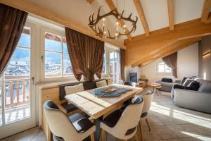 Posezení v ubytování Attico Faloria Luxury
