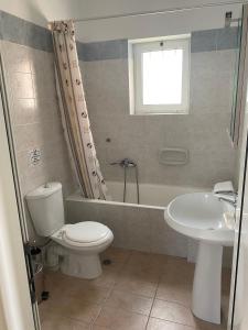 Kúpeľňa v ubytovaní Poseidon Studios & Apartments