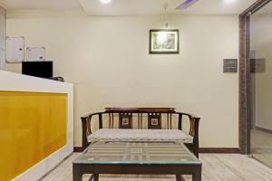 a room with a bed in the middle of a room at Itsy By Treebo - Ransu Residency in Guwahati