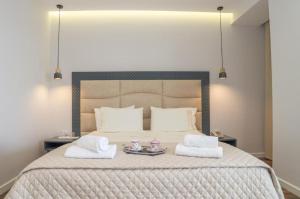 Postel nebo postele na pokoji v ubytování Hotel Vila Kalcuni Sarande