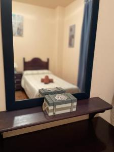 Postel nebo postele na pokoji v ubytování Apartamentos San Bruno Canela