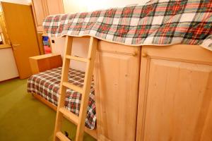 A bed or beds in a room at Maso 21