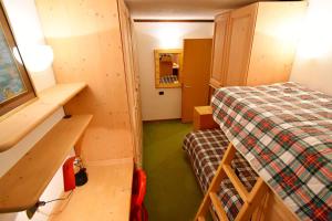 A bed or beds in a room at Maso 21