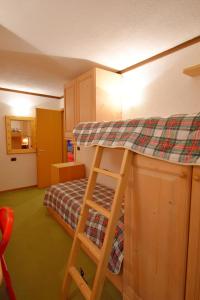 A bed or beds in a room at Maso 21
