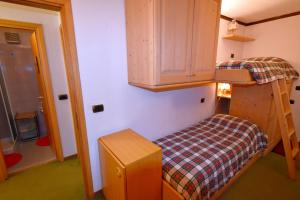 A bed or beds in a room at Maso 21